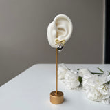 BI-METAL BOW EARRINGS - 18K GOLD-PLATED