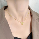 BOW GIRL NECKLACE - 18K GOLD-PLATED