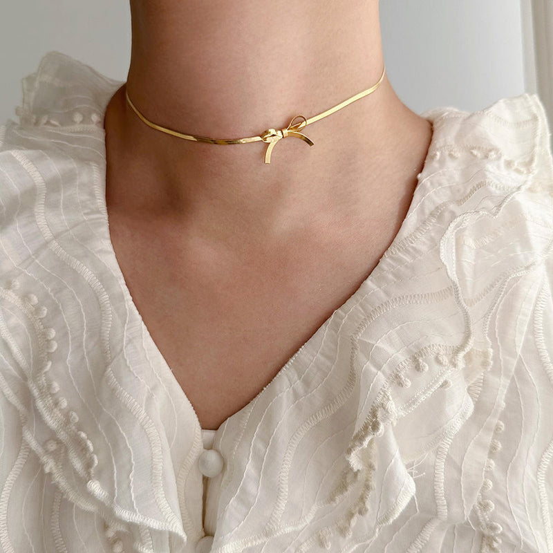 BOW NECKLACE - 18K WHITE/GOLD-PLATED