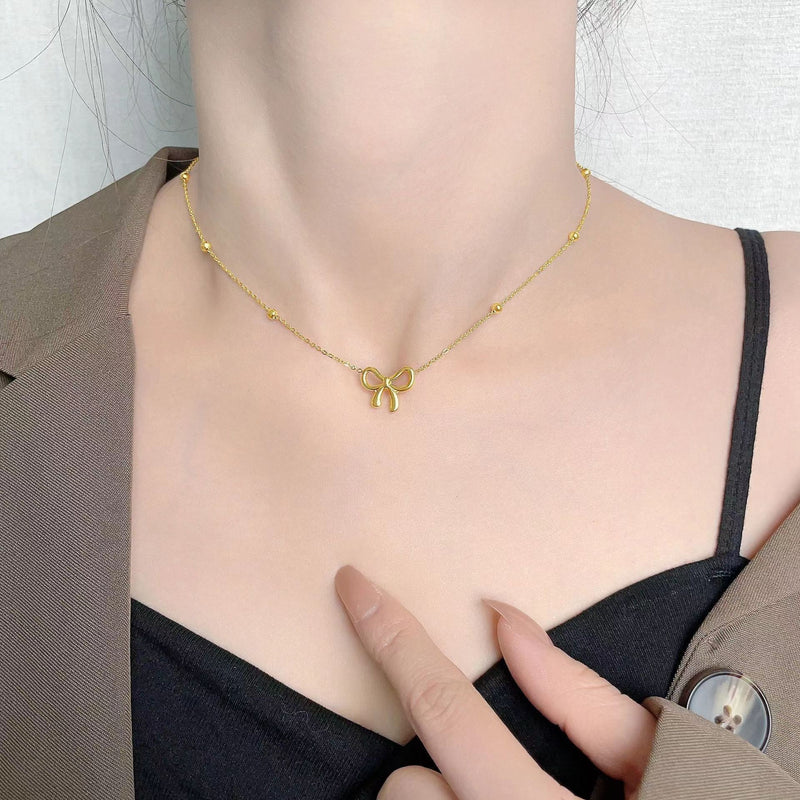 BOW GIRL NECKLACE - 18K GOLD-PLATED