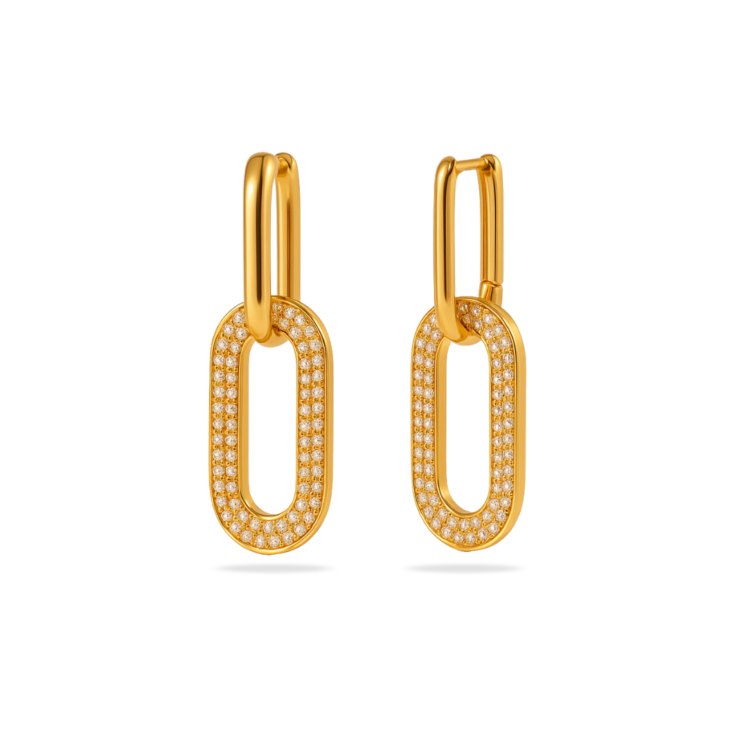 Gold hoop earrings with embedded stones on a white background