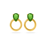 Gold earrings with green gemstones on a white background