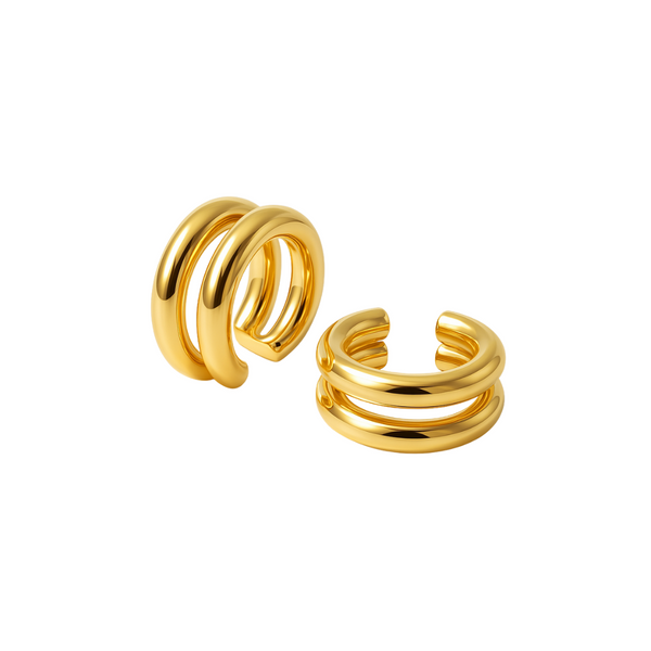 Pair of gold spiral earrings on a white background